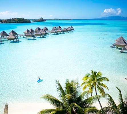 Experience pure paradise at InterContinental Bora Bora Le Moana Resort. Indulge in luxury with 62 exquisite bungalows, including overwater and beachside options offering breathtaking views of the turquoise lagoon and horizon. Immerse yourself in the beauty of soft white sand beaches and crystal-clear waters. Delight in world-class amenities, exceptional service, and unforgettable dining experiences. Prepare to be enchanted by the ultimate tropical getaway.